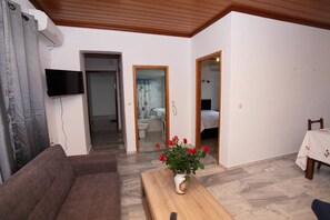 Appartement, 1 slaapkamer | Woonruimte | Flatscreentelevisie