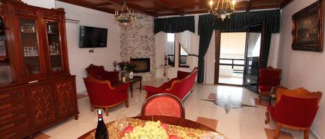 Apartment, 2 Bedrooms | Living area | Flat-screen TV