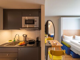 Studio, 1 Queen Bed | Hypo-allergenic bedding, in-room safe, individually furnished, desk