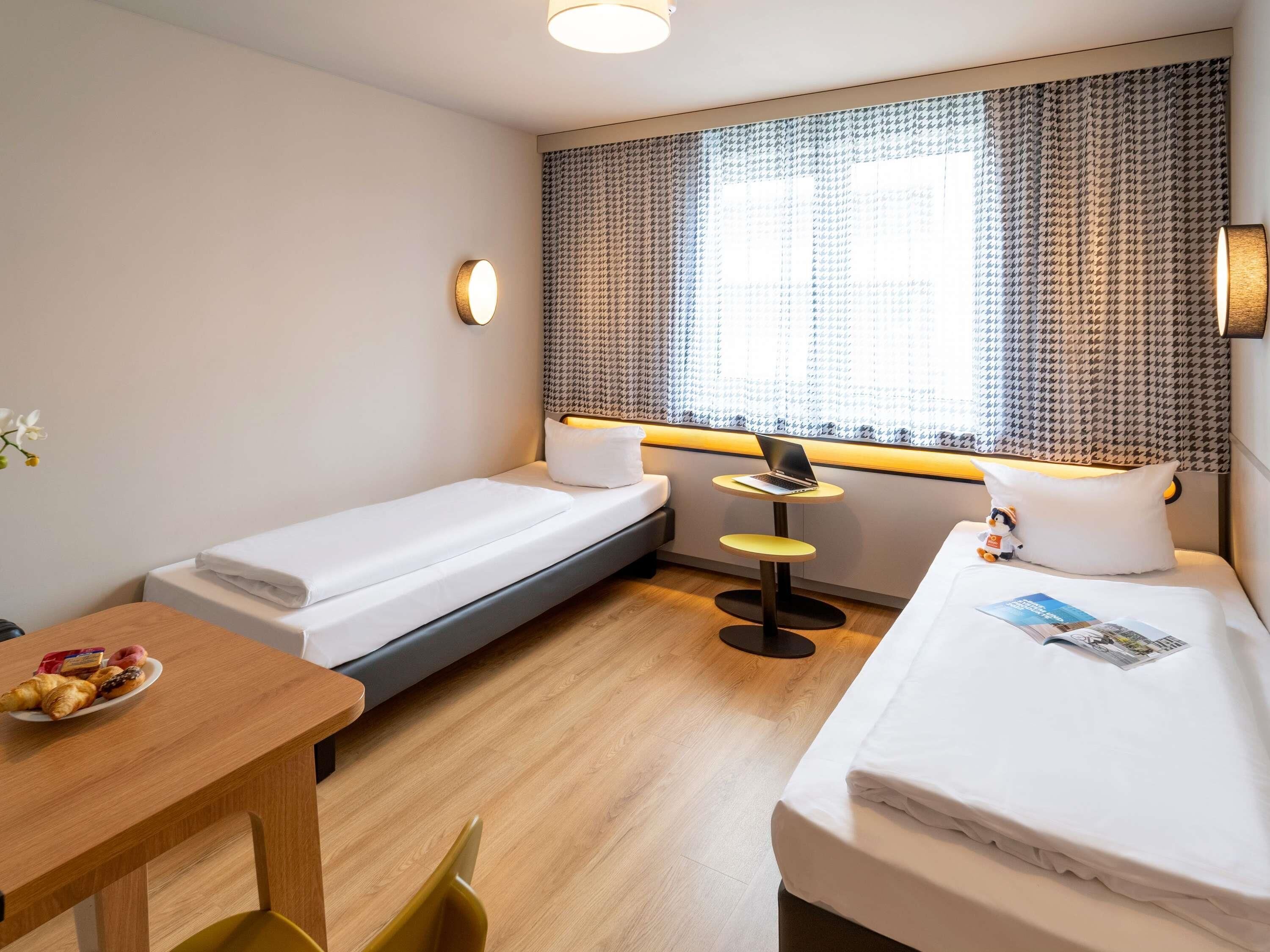 Studio, 2 Single Beds | Hypo-allergenic bedding, in-room safe, individually furnished, desk