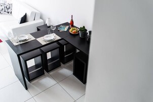 Studio, Multiple Bedrooms, Balcony, Garden View | Living area