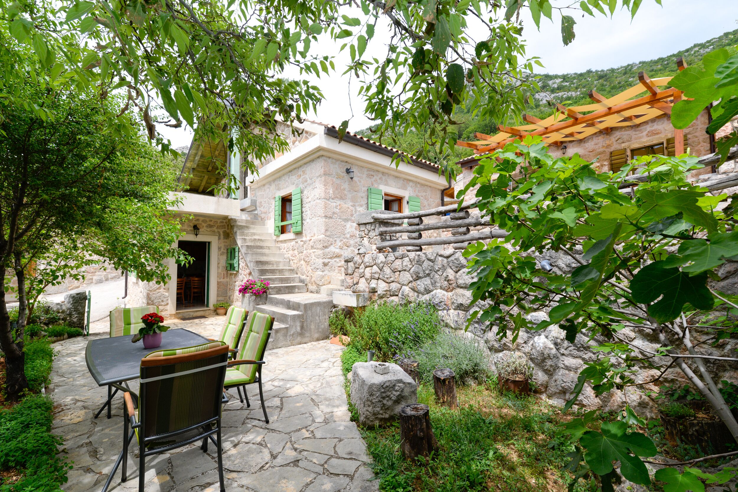 House, 1 Bedroom, Balcony, Garden View | Property grounds