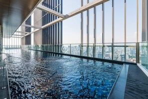 Departamento, 1 habitación, balcón, vista a la ciudad | Alberca | Alberca al aire libre 