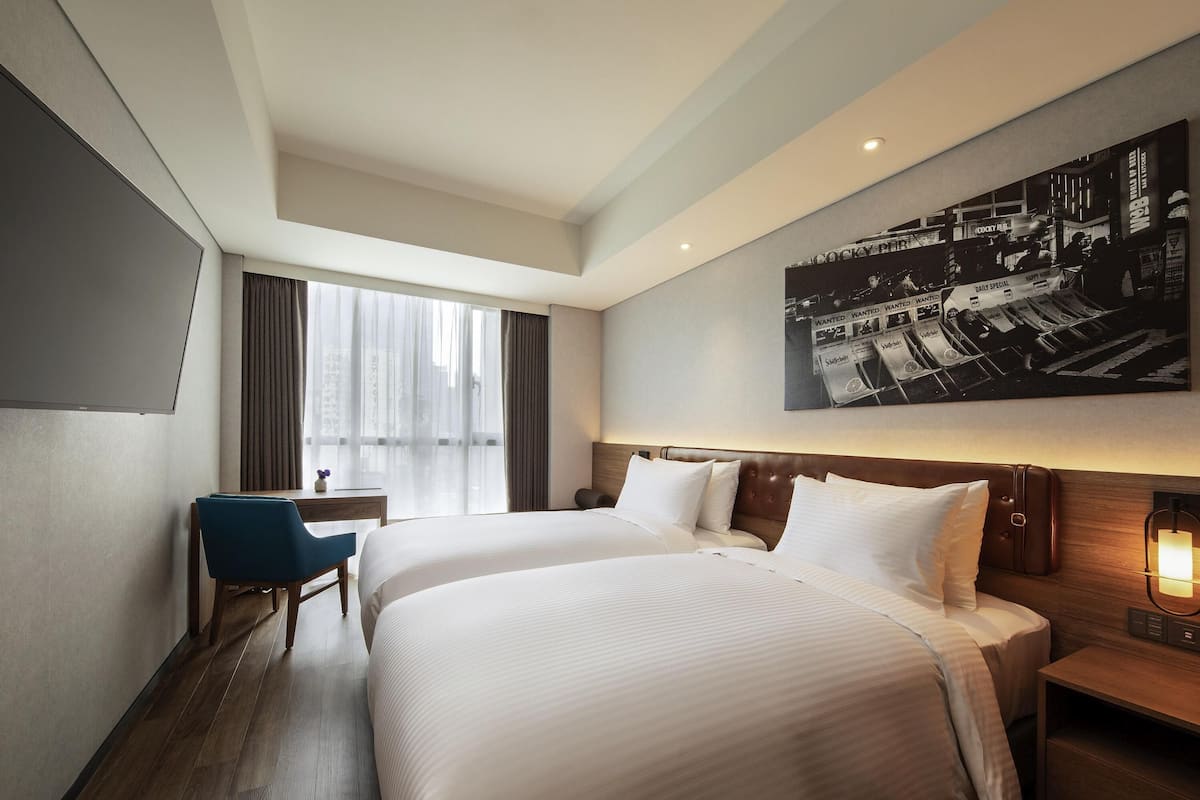 Rom – superior, 2 enkeltsenger | Sengetøy av topp kvalitet, safe på rommet og individuelt innredet