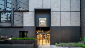 A modern hotel entrance with a sign indicating it's the Myre Hotel in Seoul, Hongdae. - Mercure Ambassador Seoul Hongdae (Seoul)