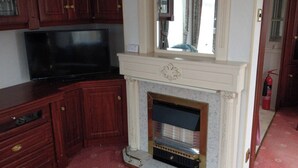 Chalet, 2 Bedrooms, Patio, Lake View | Living room | TV - The Boat House Chalet - Boat of Garten - Near Aviemore - Sleeps 6 (Boat of Garten)