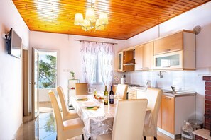 Fridge, electric kettle, cookware/dishes/utensils