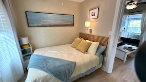 1 bedroom, desk, iron/ironing board, travel crib