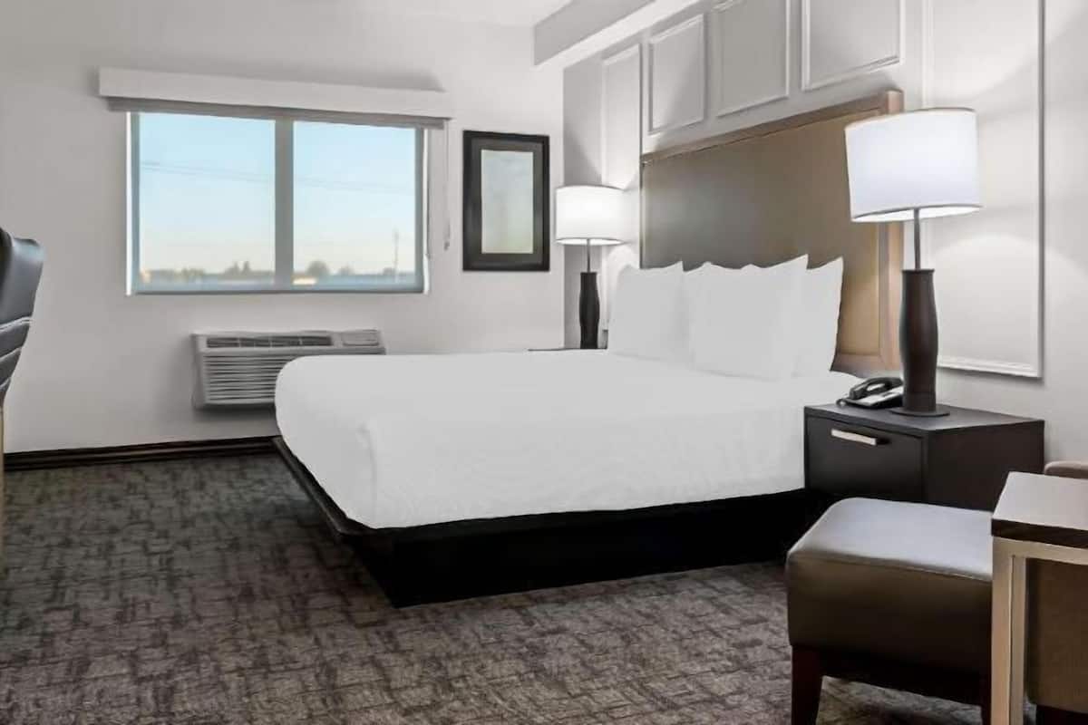 Pillowtop beds, desk, laptop workspace, iron/ironing board