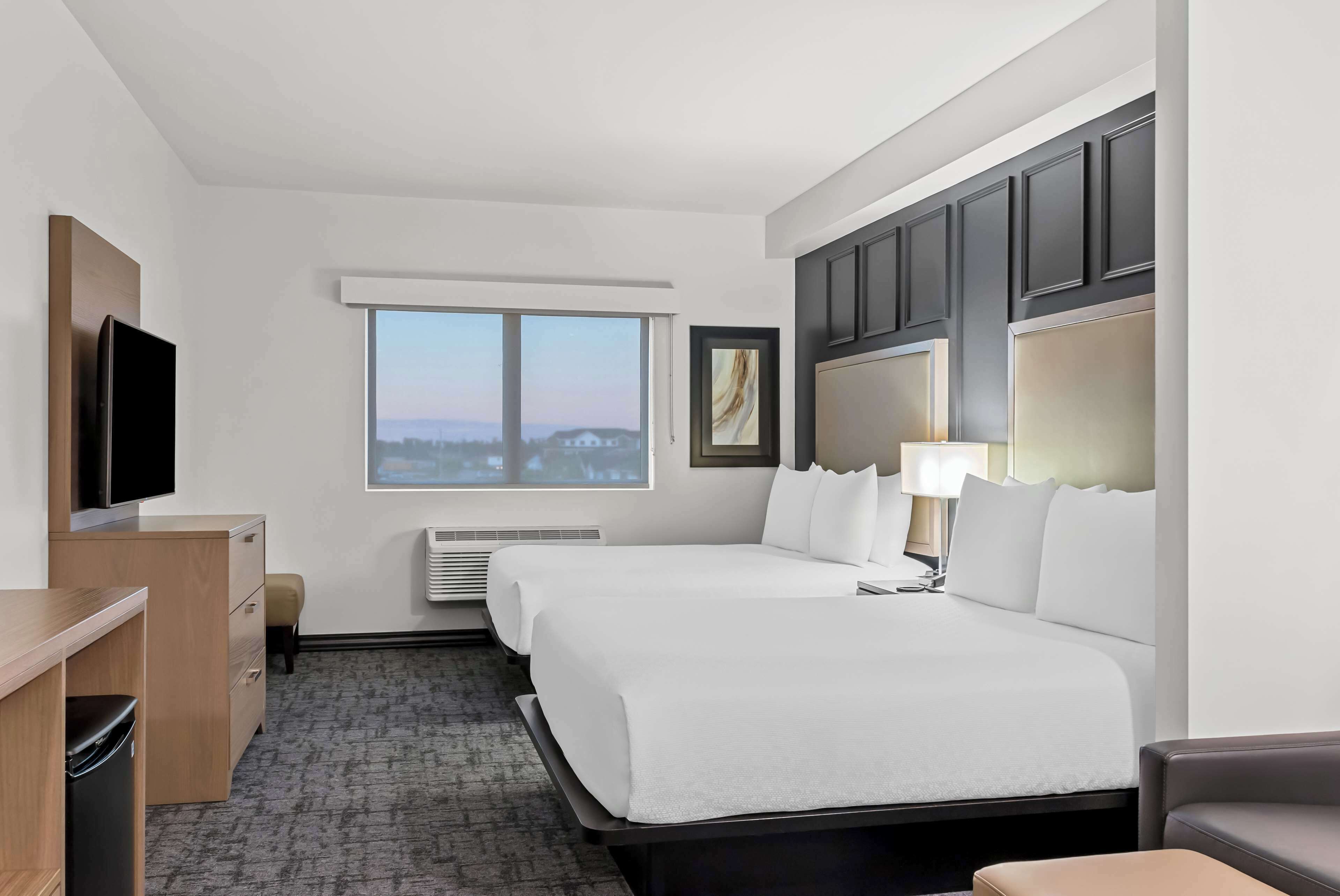 Suite, 2 Queen Beds, Accessible, Refrigerator & Microwave (with Sofabed) | Pillowtop beds, desk, laptop workspace, iron/ironing board