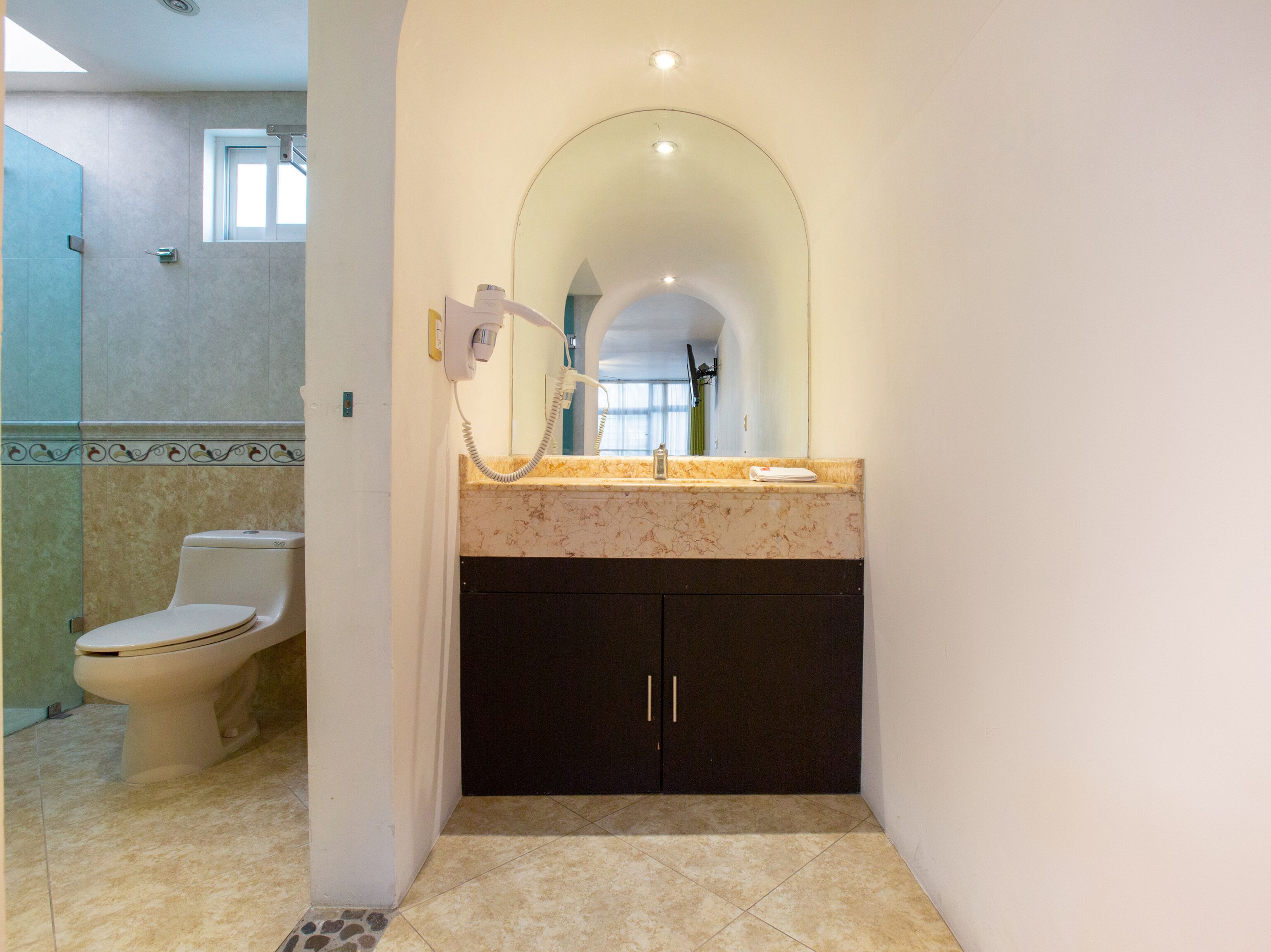 standard room, multiple beds | bathroom sink