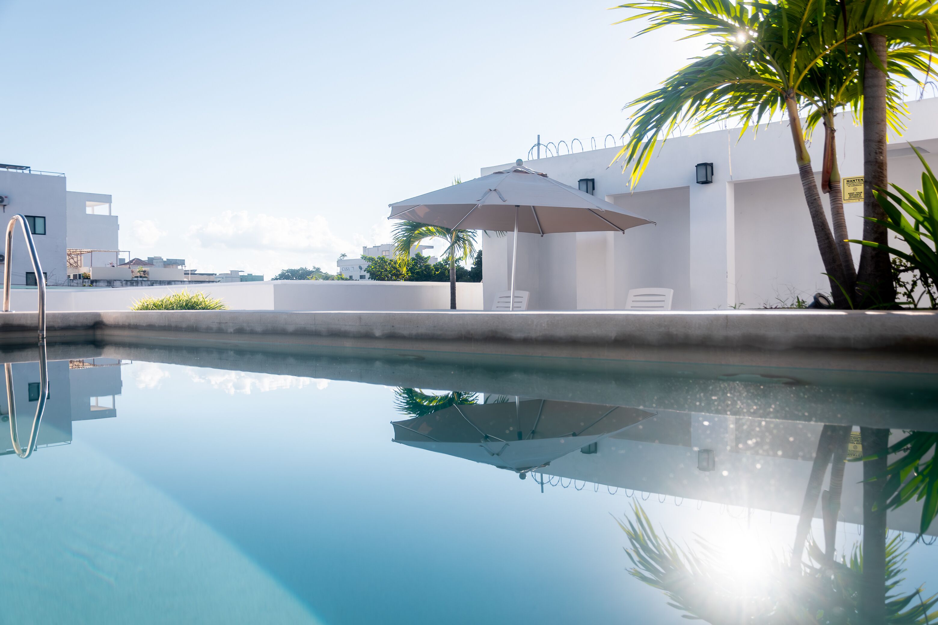 Outdoor pool, pool umbrellas, pool loungers