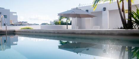 Outdoor pool, pool umbrellas, pool loungers