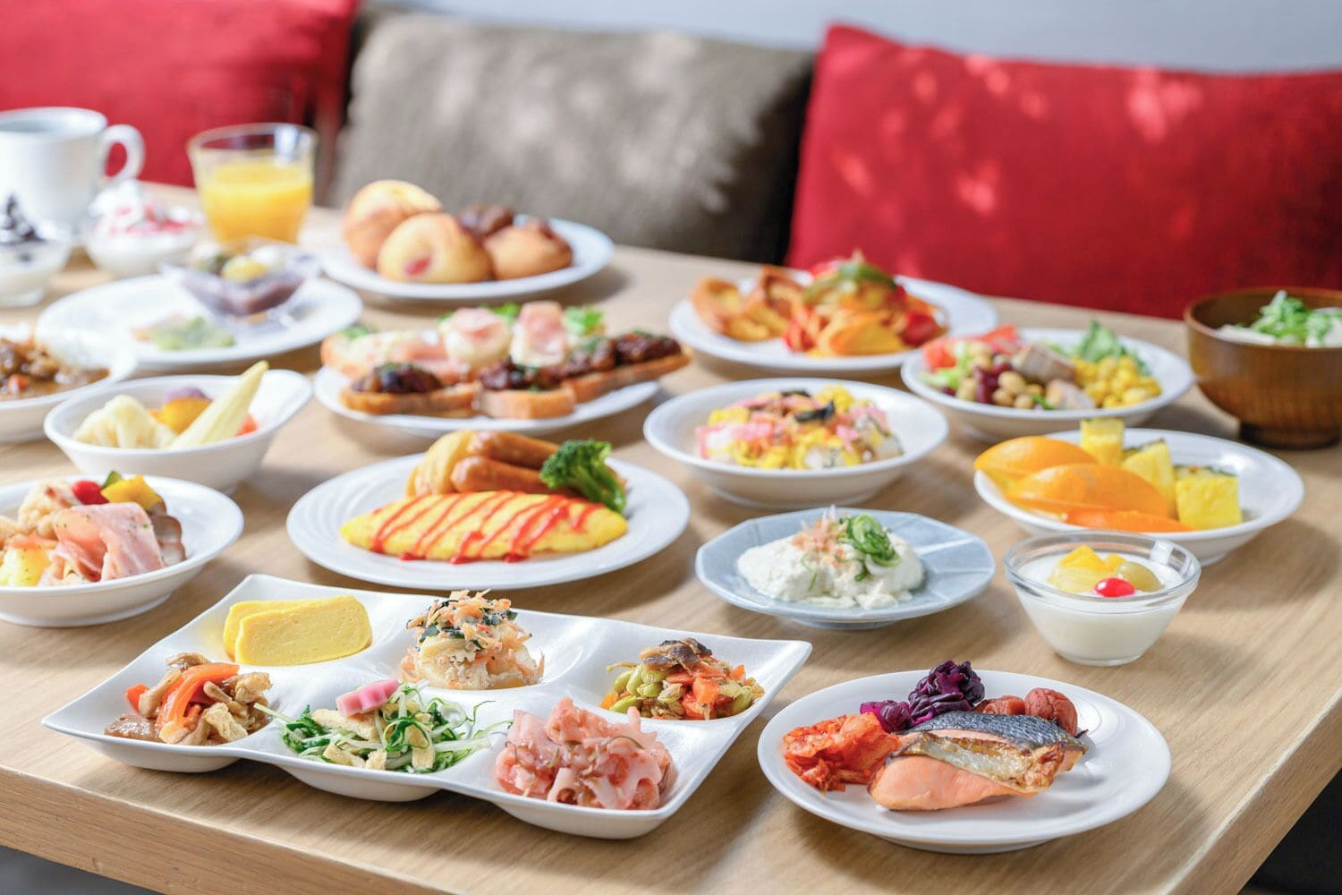 A variety of dishes on a table, suggesting a buffet or meal setting.
