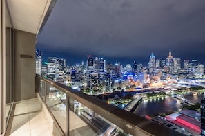 Enjoy breathtaking city views from the spacious balcony.