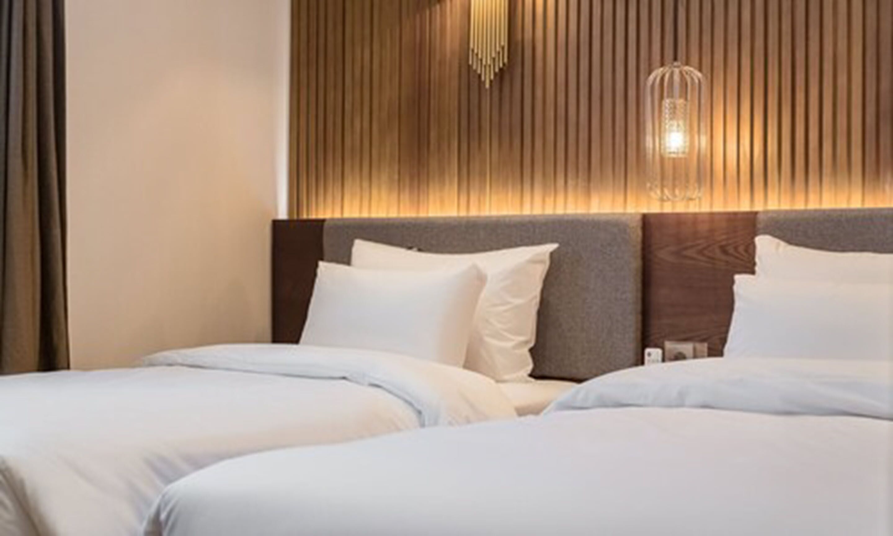 premium bedding, down duvets, pillow-top beds, individually decorated