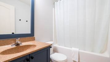 Hair dryer, towels, soap, shampoo