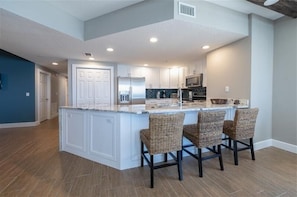 Fridge, microwave, oven, stovetop - Penthouse #1102 - Direct Oceanfront NE Corner  Luxury 3/3  Sanibel Condominium (Daytona Beach Shores)