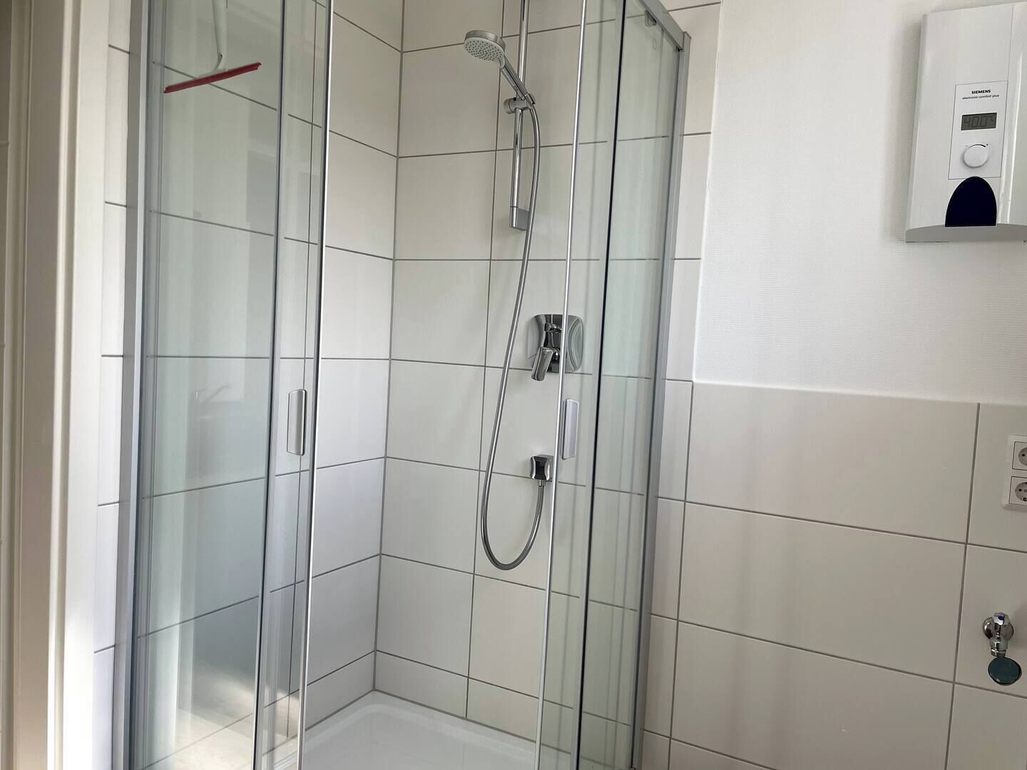 Standaard appartement | Badkamer | Gratis toiletartikelen, een haardroger, handdoeken, zeep
