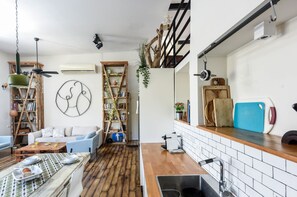 Apartment, 3 Bedrooms, Balcony | In-room dining - Modern Loft Retreat with Rooftop by Sea N Rent (Tel Aviv)