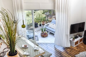 Apartment, 3 Bedrooms, Balcony | Living area - Modern Loft Retreat with Rooftop by Sea N Rent (Tel Aviv)