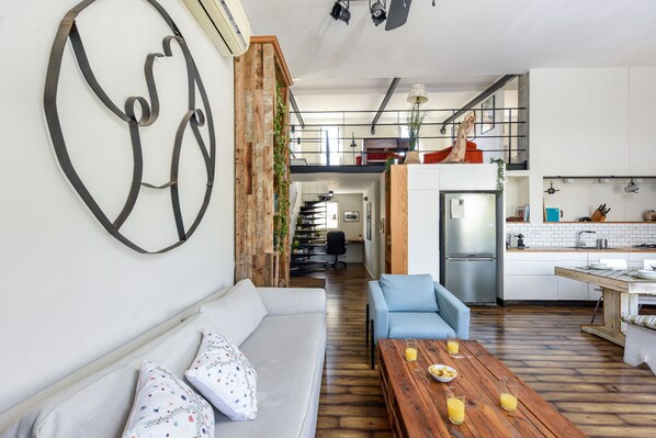 Apartment, 3 Bedrooms, Balcony | Living area - Modern Loft Retreat with Rooftop by Sea N Rent (Tel Aviv)