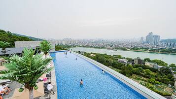 Outdoor pool, open 3:00 PM to 9:00 PM, cabanas (surcharge), sun loungers