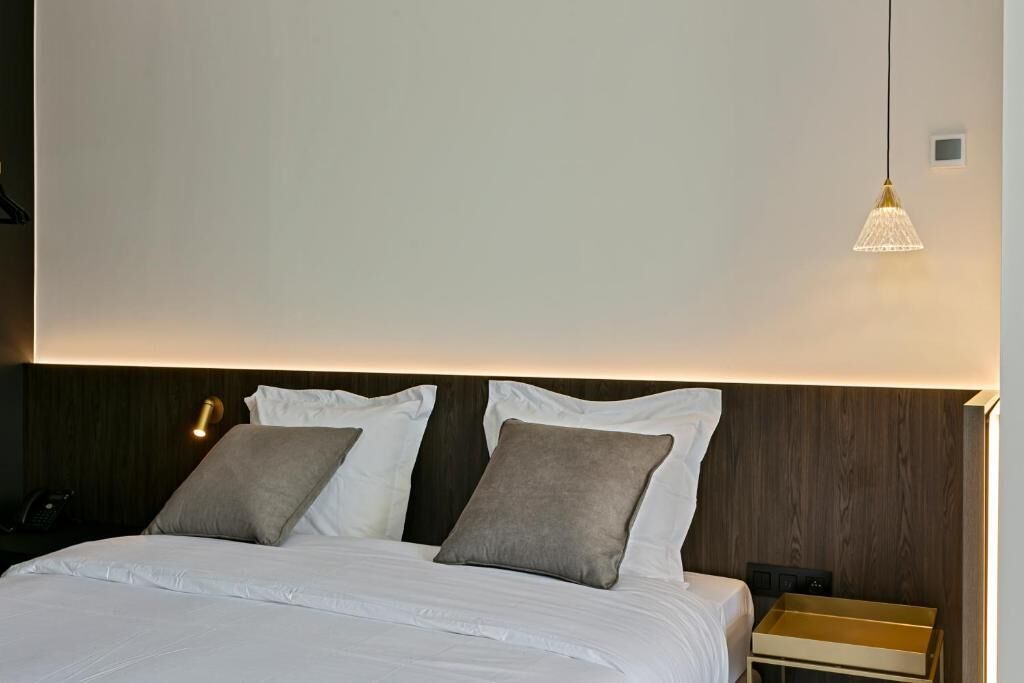 deluxe room | in-room safe, desk, laptop workspace, blackout curtains