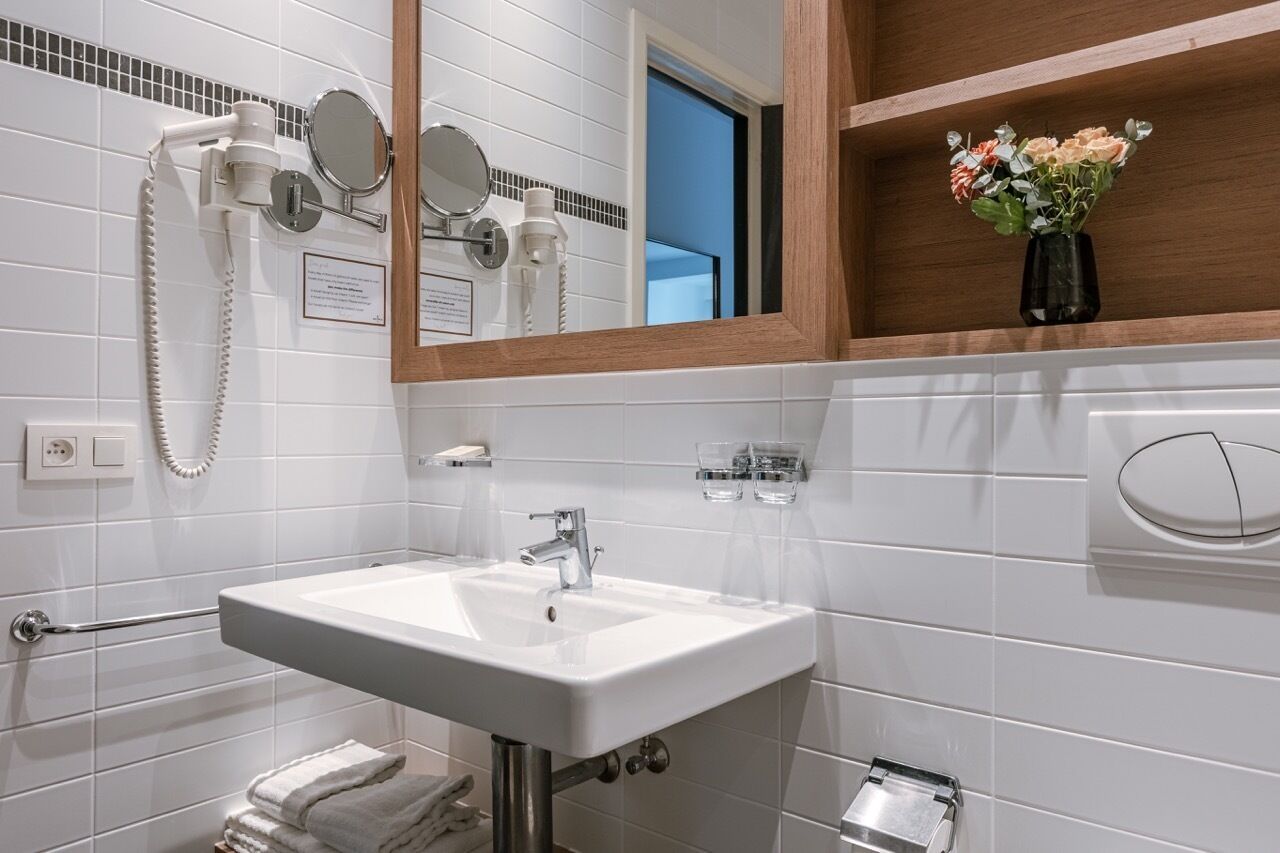 free toiletries, hair dryer, slippers, towels