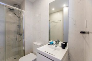 Shower, shampoo, toilet paper