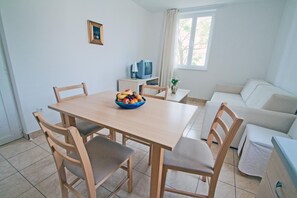 Apartment, 1 Bedroom, Accessible, Patio | Living area | TV
