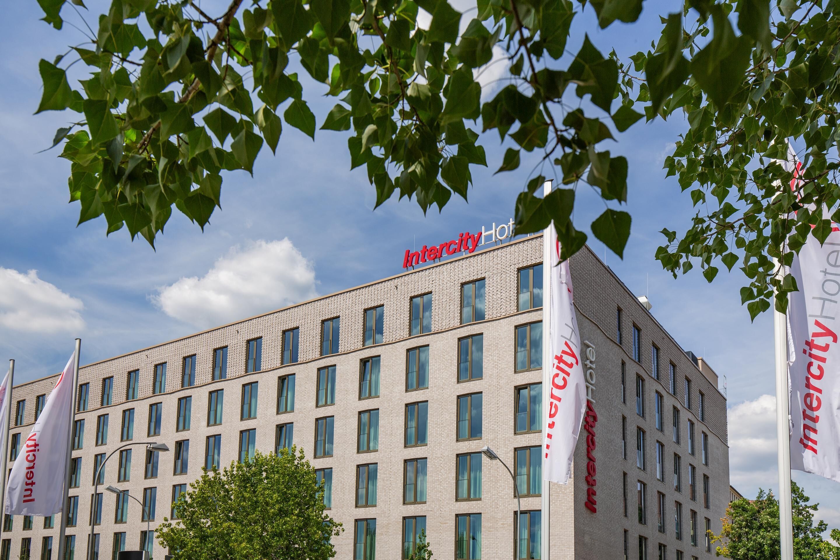 A multi-story hotel building with the name "Intercity Hotel" prominently displayed on the facade.