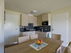 Villa | Private kitchen | Fridge, microwave, dishwasher
