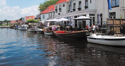 Cozy Chalet Right on the Water in Friesland