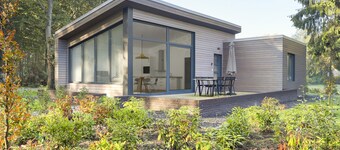 帶有遮蔽陽台的度假屋