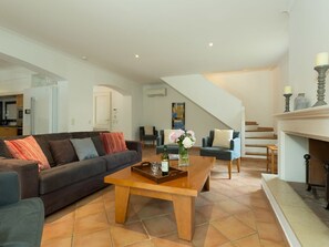 Villa | Living room | Fireplace - Detached Villa With a Dishwasher and AC, in a Quiet Area (Sainte-Maxime)