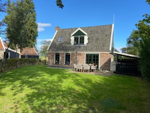 Villa | Exterior - Lush Villa with Hot Tub, Private Fenced Garden in Hippolytushoef (Hippolytushoef)