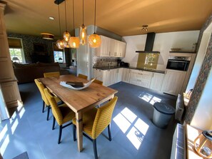 Villa | Dining - Lush Villa with Hot Tub, Private Fenced Garden in Hippolytushoef (Hippolytushoef)