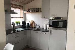 House | Private kitchen | High chair - Holiday Home With Private Garden by the sea (Ballum)