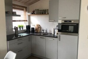 House | Private kitchen | Highchair - Holiday Home With Private Garden by the sea (Ballum)