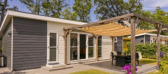 Sunlit Chalet by the Pond