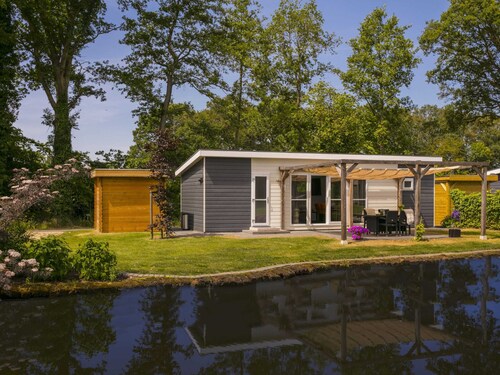 Sunlit Chalet by the Pond