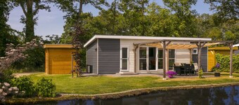 Sunlit Chalet by the Pond