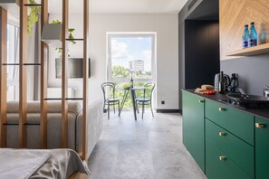 Studio – comfort | Eget kjøkken | Minikjøleskap, kokeplater, espressomaskin og kaffetrakter/tekoker