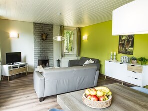 Bungalow | Wohnzimmer | Kamin, DVD-Player