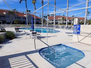 Outdoor pool, a heated pool - Isla Del Sol Condo, Heated Pool, Water/Golf Views, 5 mins to St. Pete Beach! (St. Petersburg)