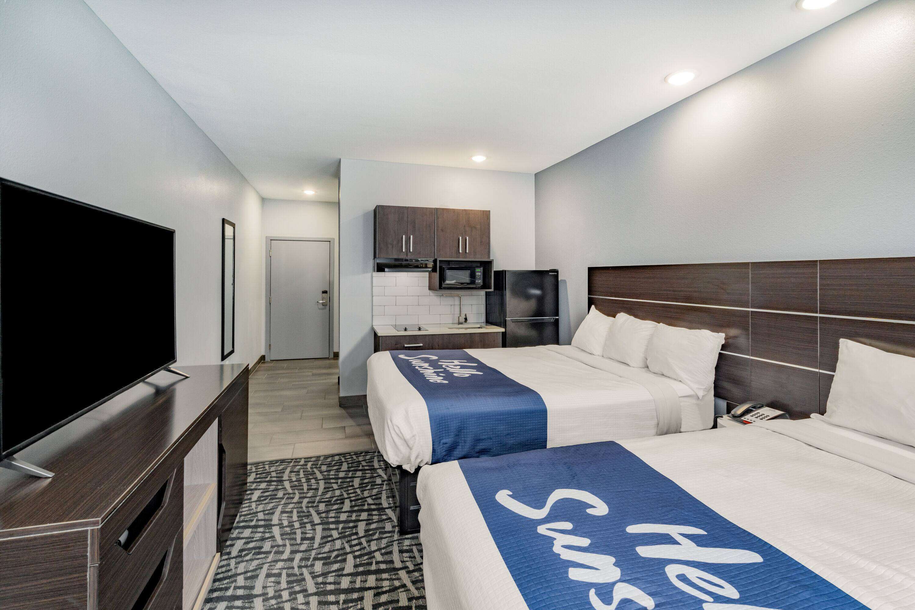 room, 2 queen beds, non smoking (kitchenette) | 1 bedroom, desk, laptop workspace, iron/ironing board