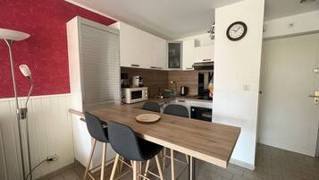 Fridge, microwave, cookware/dishes/utensils