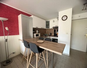 Fridge, microwave, cookware/dishes/utensils