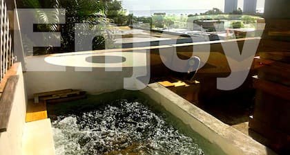 Jay’s home by the beach and rainforest couples retreat